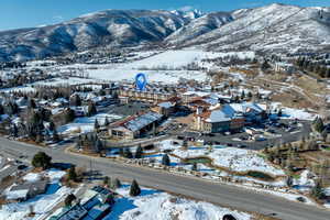 Snowy aerial view with a mountain view