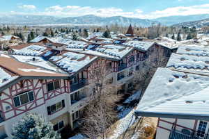 Snowy aerial view with a mountain view