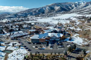 Snowy aerial view with a mountain view
