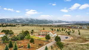 Aerial view with a mountain view and a rural view