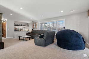 Living room featuring carpet floors