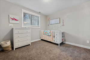 View of carpeted bedroom