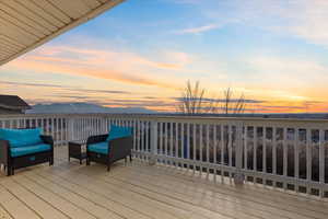 Deck at dusk with a mountain view