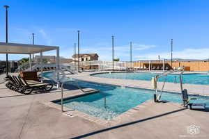 View of pool with a patio area