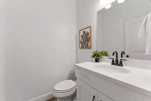 Bathroom with vanity and toilet