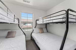 View of carpeted bedroom