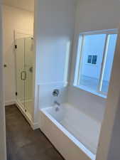 Bathroom with separate shower and tub