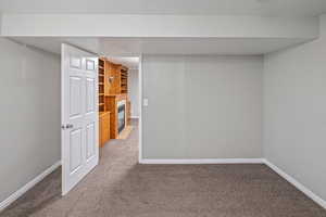 Basement with carpet