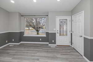 Foyer featuring light hardwood / wood-style floors