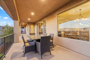 View of patio / terrace with a balcony