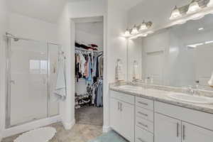 Bathroom with vanity and walk in shower