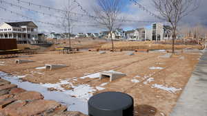 View of yard layered in snow