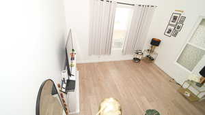 Interior space with light hardwood / wood-style flooring