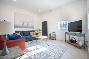 Living room featuring light hardwood / wood-style flooring