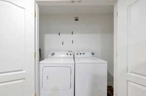 Clothes washing area with washing machine and clothes dryer