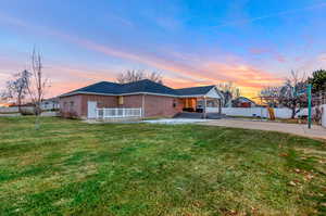 View of front of property featuring a yard