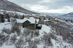 Snowy aerial view with a mountain view