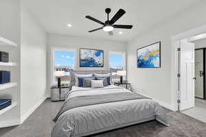 Bedroom featuring carpet floors and ceiling fan