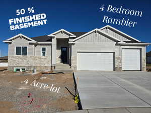 View of front of home with a garage