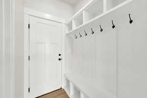 Mudroom featuring hardwood / wood-style floors