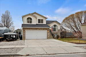 View of property with a garage