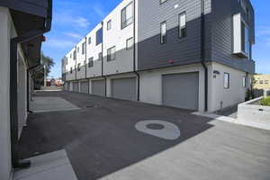 Shared driveway featuring 1 car garage