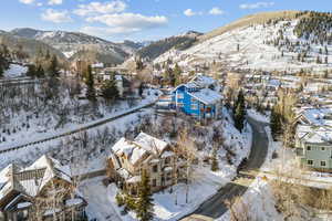 Snowy aerial view with a mountain view