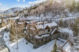 Snowy aerial view with a mountain view