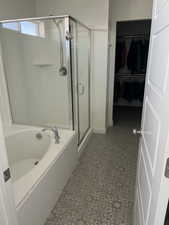 Bathroom with plus walk in shower