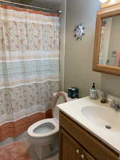 Bathroom with vanity and toilet