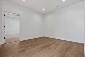 Unfurnished room featuring light hardwood / wood-style floors