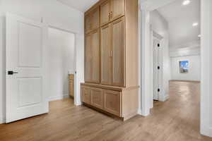 Hallway featuring light hardwood / wood-style floors