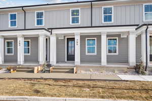 View of front of home featuring covered porch