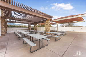 View of patio / terrace featuring a pergola and a mountain view