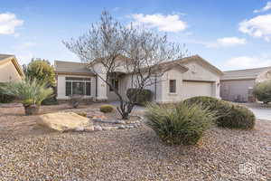 Ranch-style home featuring a garage