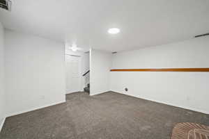 Interior space with dark colored carpet