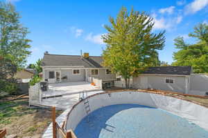 View of swimming pool featuring a wooden deck