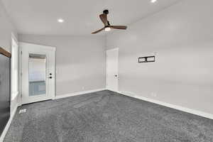 Primary Bedroom with vaulted ceiling, deck access, and plenty of light!