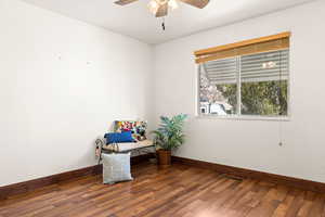 Interior space featuring hardwood / wood-style floors and ceiling fan