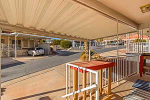 View of patio / terrace with a carport