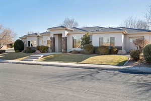 View of front of house featuring a front lawn