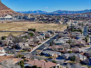 Birds eye view of property with a mountain view