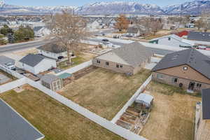 Birds eye view of property with a mountain view