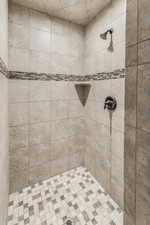 Bathroom with tiled shower