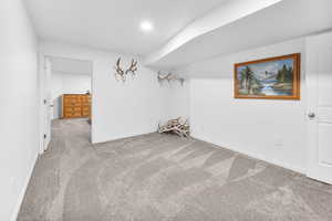 Unfurnished room with carpet flooring