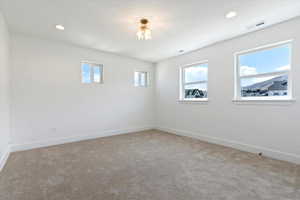 Unfurnished room featuring carpet floors