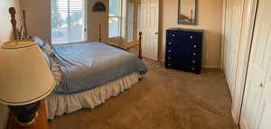 View of carpeted bedroom