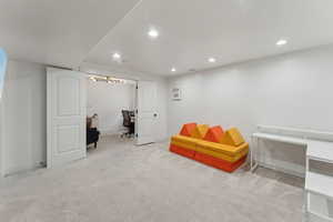 Living area with light carpet