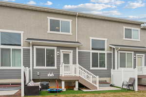 Back of property featuring central AC unit