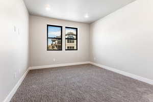 View of carpeted spare room